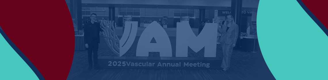 People Standing by VAM Sign